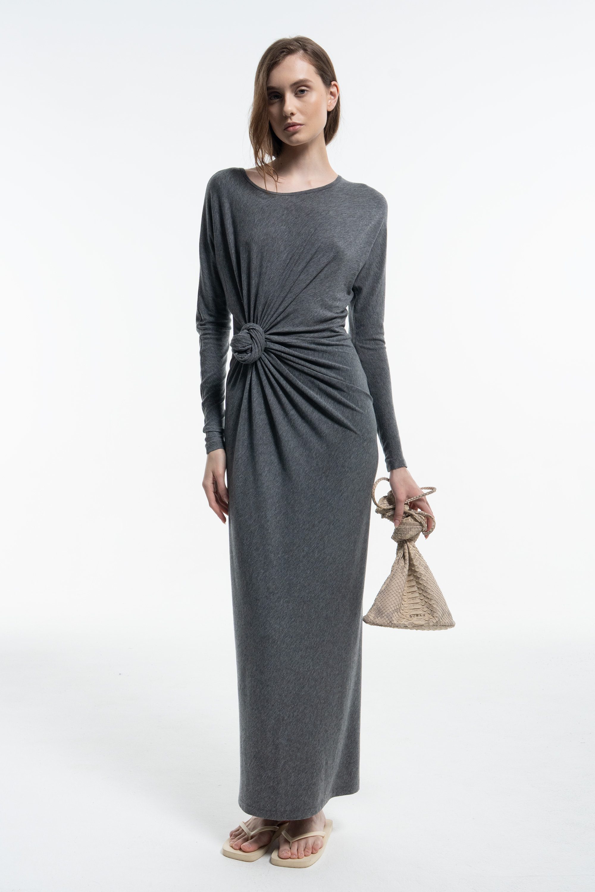 Knitted dress with a knot