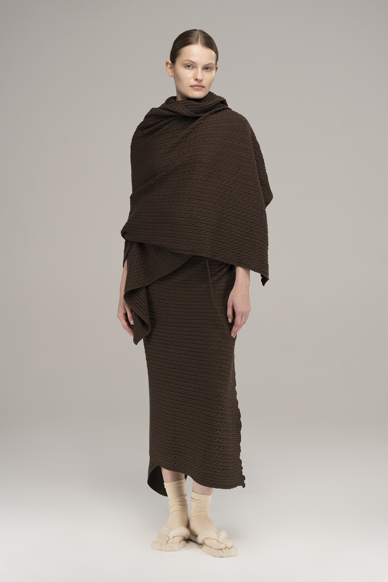 Knitted stole with braids