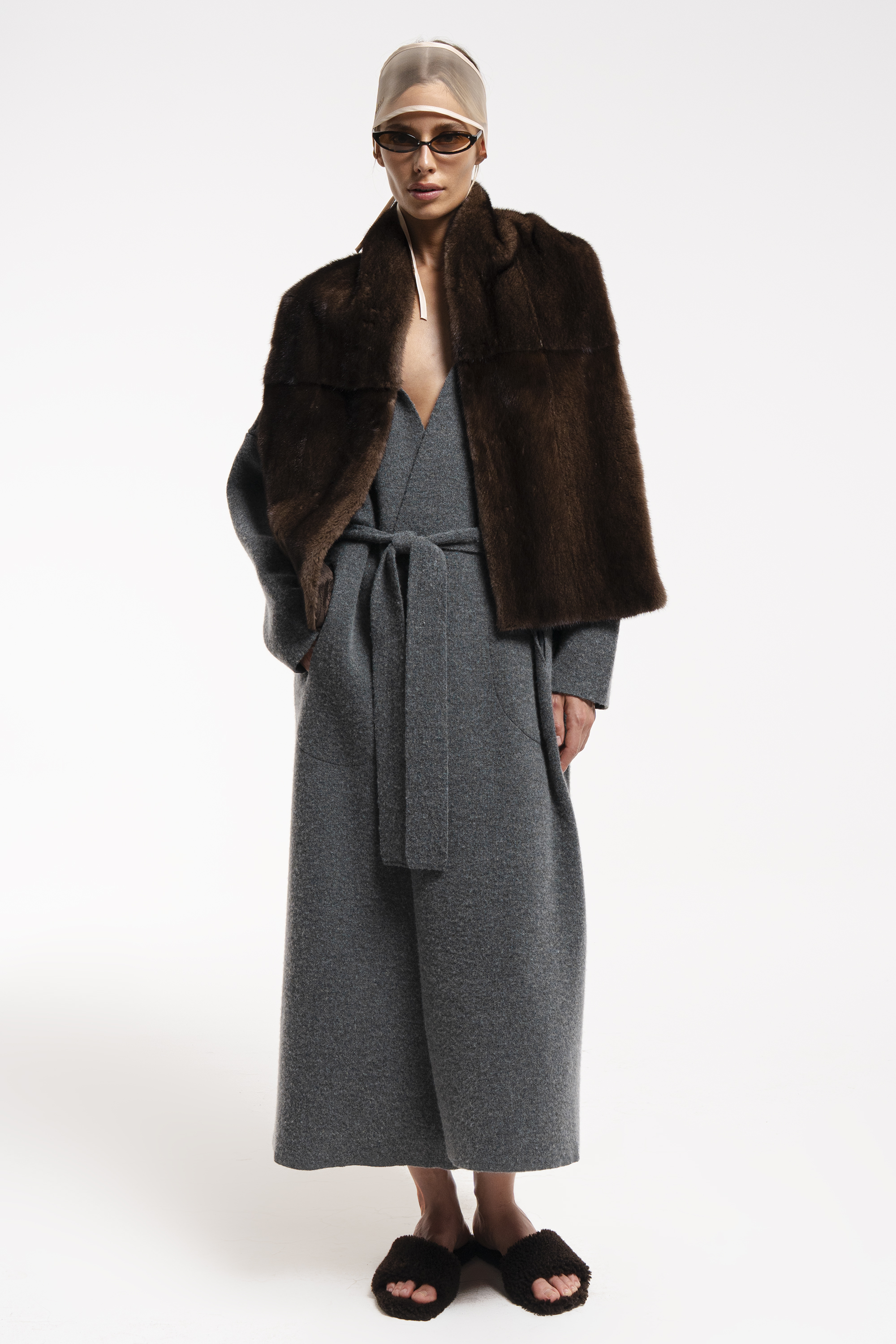 Knitted coat with a mink collar