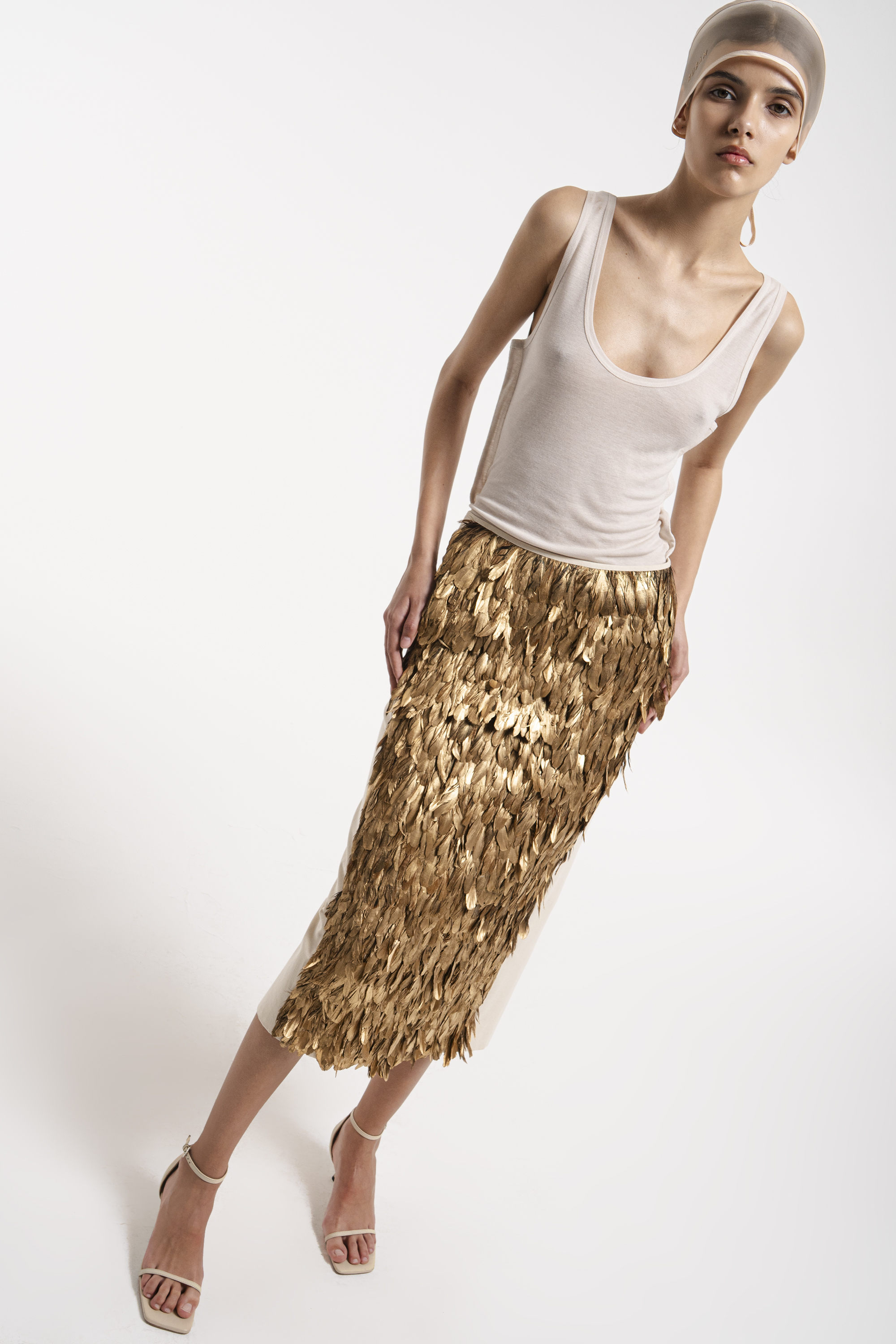 Skirt with feather embellishment