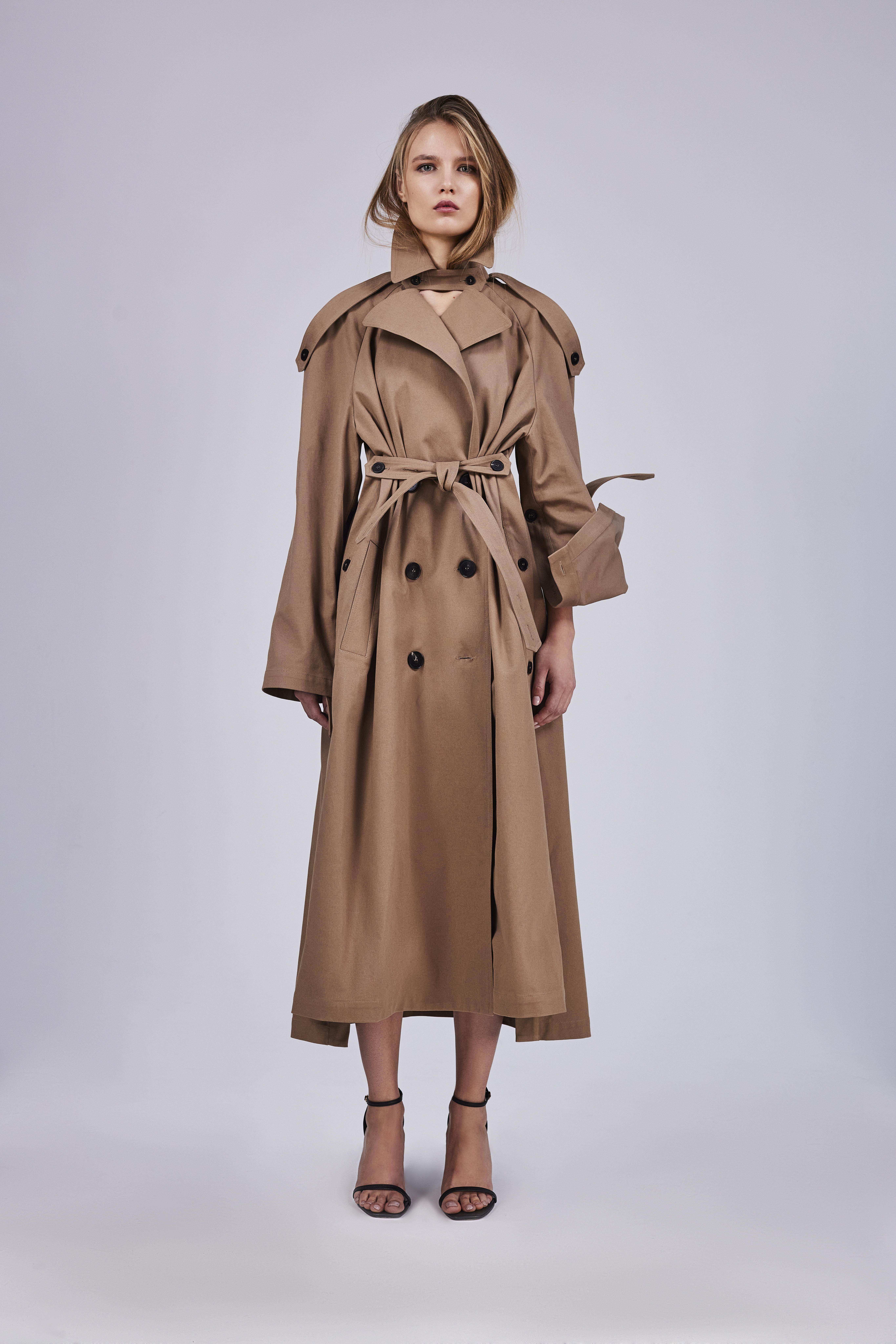  Trench coat with side fastenings